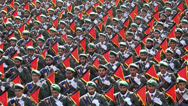 In this Sept. 21, 2016 file photo, Iran's Revolutionary Guard troops march in a military parade marking the 36th anniversary of Iraq's 1980 invasion of Iran, in front of the shrine of late revolutionary founder Ayatollah Khomeini, just outside Tehran, Iran - Sputnik Brasil