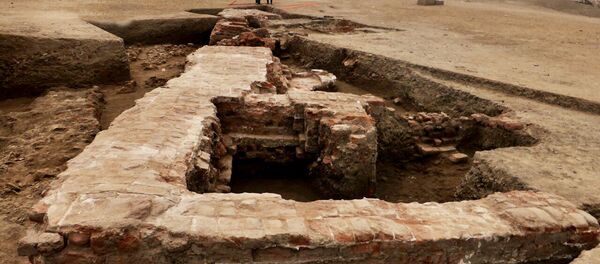 Seção de uma estrutura de tijolo greco-romana descoberta no campo arqueológico de Sa el-Hagar, ao norte do Cairo Seção de uma estrutura de tijolo greco-romana descoberta no campo arqueológico de Sa el-Hagar, ao norte do Cairo - Sputnik Brasil