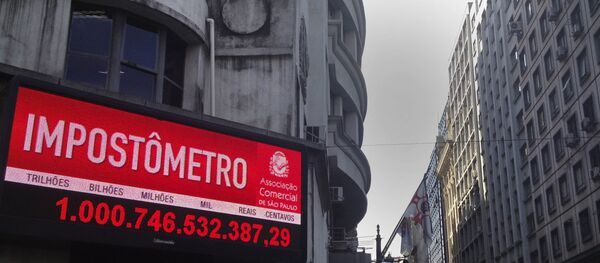 Impostômetro Associação Comercial de São Paulo (ACSP), no Centro da cidade de São Paulo-SP, ultrapassa a mara de R$ 1 trilhão cada vez mais cedo. - Sputnik Brasil
