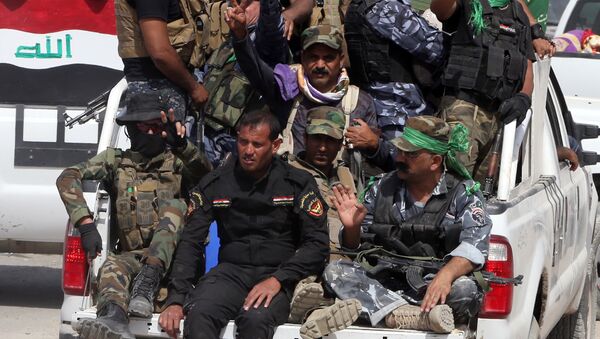 Milícia popular no Iraque lutando contra EI perto da cidade de Ramadi - Sputnik Brasil