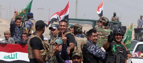 Milícia popular no Iraque lutando contra EI perto da cidade de Ramadi - Sputnik Brasil