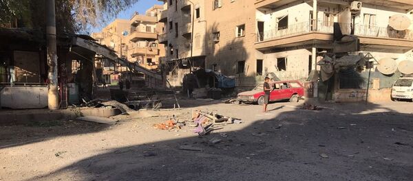 Rescaldo de ataques de artilharia em Al-Qusur, um bairro na cidade síria de Deir ez-Zor. - Sputnik Brasil