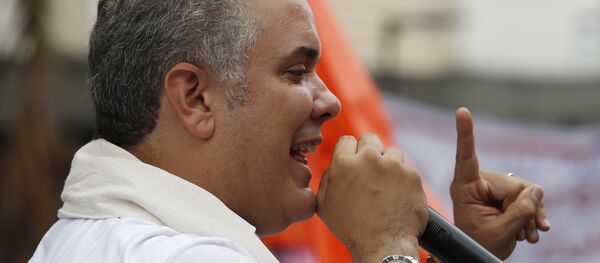 Iván Duque, em comício na Colômbia, em 10 de junho de 2018. - Sputnik Brasil