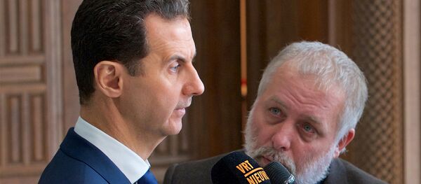 Presidente sírio Bashar Assad fala ao grupo de correspondentes belgas (foto de arquivo) - Sputnik Brasil