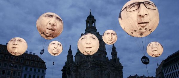 Balões com rostos de líderes dos países-membros do G7 perto da catedral de Frauenkirche, Dresde, em 27 de maio, dia da cúpula dos ministros das Finanças e chefes dos Bancos Centrais dos G7. - Sputnik Brasil