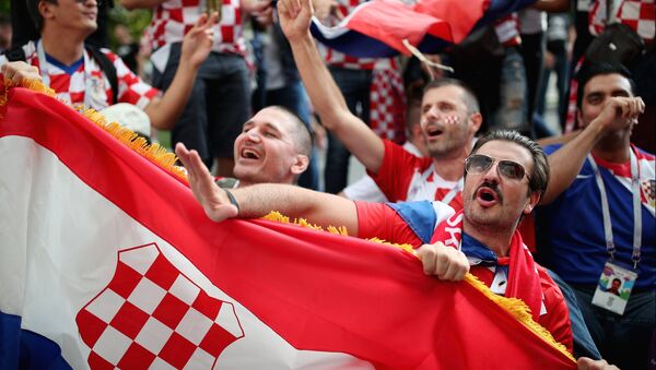 Torcedores croatas antes do jogo entre Croácia e Inglaterra pela semifinal da Copa do Mundo FIFA 2018 - Sputnik Brasil
