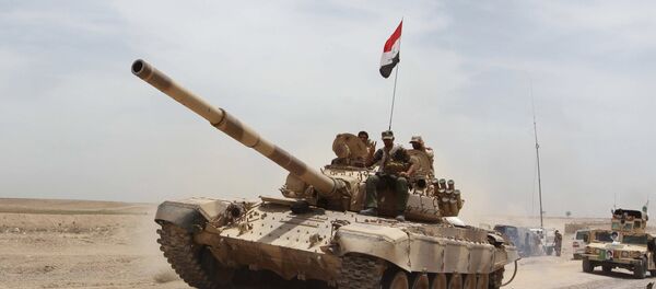 Os militares iraquianos e as milícias xiitas tentam retomar Ramadi das mãos do Estado Islâmico. - Sputnik Brasil