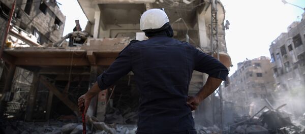 Capacetes Brancos na Síria, 5 de outubro de 2016 (foto de arquivo) Capacetes Brancos na Síria, 5 de outubro de 2016 (foto de arquivo) - Sputnik Brasil