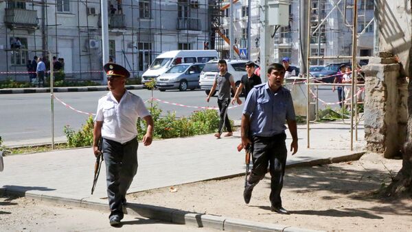 Agentes das forças de segurança do Tajiquistão em Dushanbe, capital do país (arquivo) - Sputnik Brasil