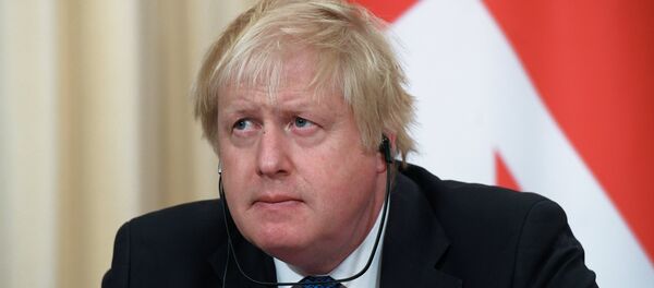 Boris Johnson em Moscou. - Sputnik Brasil