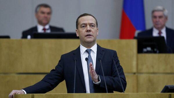 Prime Minister Dmitry Medvedev presents the 2017 Government performance report at the State Duma - Sputnik Brasil