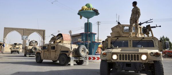 Segurança afegã patrulha cidade de Ghazni na província de Cabul, Afeganistão, 12 de agosto de 2018 - Sputnik Brasil