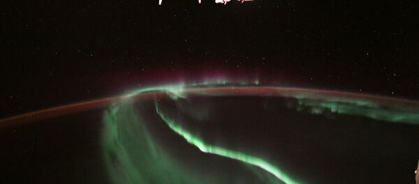 Aurora boreal fotografada do espaço pelo astronata da NASA, Alexander Gerst - Sputnik Brasil