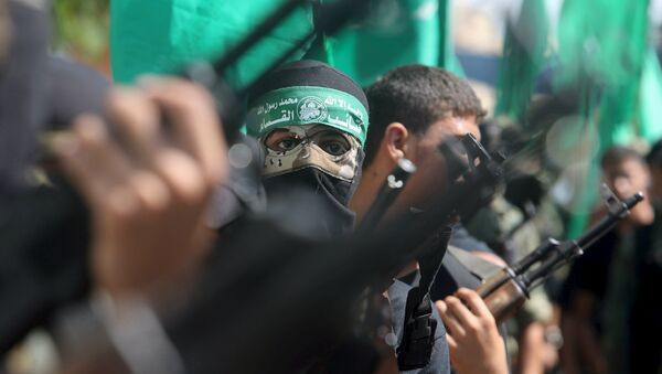 Militantes palestinos do Hamas participam de um protesto contra a operação da polícia israelense na mesquita de al-Aqsa, no sul da Faixa de Gaza, em 18 de setembro de 2015 (imagem de arquivo) - Sputnik Brasil
