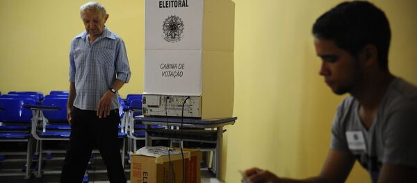 Eleitor vota nas eleições de 2014. - Sputnik Brasil