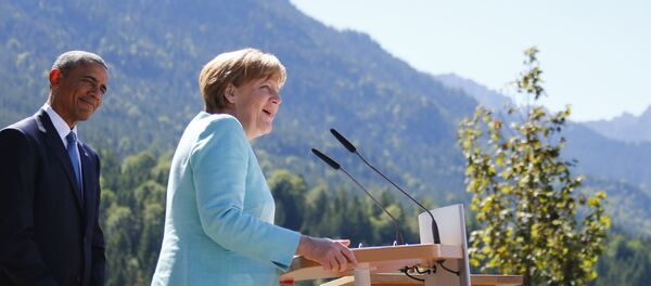 Barack Obama e Angela Merkel em encontro com cidadãos alemães antes da cúpula do G7 Barack Obama e Angela Merkel em encontro com cidadãos alemães antes da cúpula do G7 - Sputnik Brasil