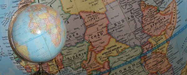 Globo e mapa da África (imagem de arquivo) Globo e mapa da África (imagem de arquivo) - Sputnik Brasil