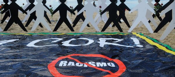 Associação do Conselho Gestor de Esporte e Lazer do Estado do Rio de Janeiro (Ascagel), promove o ato “A alma não tem cor. Não ao Racismo”, na praia de Copacabana, no Rio de Janeiro. Associação do Conselho Gestor de Esporte e Lazer do Estado do Rio de Janeiro (Ascagel), promove o ato “A alma não tem cor. Não ao Racismo”, na praia de Copacabana, no Rio de Janeiro. - Sputnik Brasil
