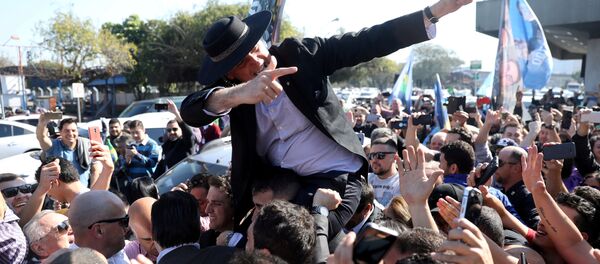 Bolsonaro no Aeroporto Salgado Filho, agosto de 2018. - Sputnik Brasil