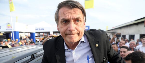 Candidato à presidência brasileira, Jair Bolsonaro, no estado de Rio Grande do Sul, em 29 de agosto de 2018 Candidato à presidência brasileira, Jair Bolsonaro, no estado de Rio Grande do Sul, em 29 de agosto de 2018 - Sputnik Brasil