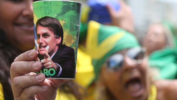 Apoiante de Jair Bolsonaro (PSL), no Rio de Janeiro, em 21 de outubro de 2018 - Sputnik Brasil