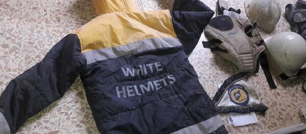 White Helmets uniform found during the search of terrorists’ headquarters in Eastern Ghouta. - Sputnik Brasil