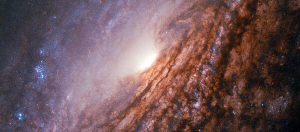 Galáxia espiral NGC 5033, localizada a 40 milhões de anos-luz da constelação Canes Venatici (imagem referencial) - Sputnik Brasil