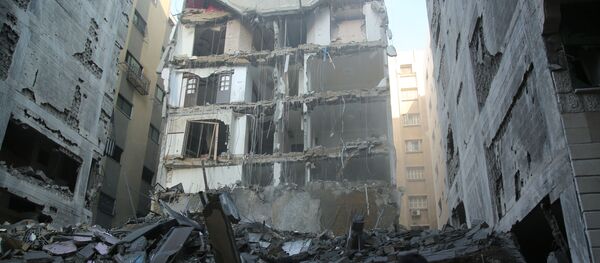 Resultado de um dos ataques com mísseis lançados por Israel na Faixa de Gaza - Sputnik Brasil