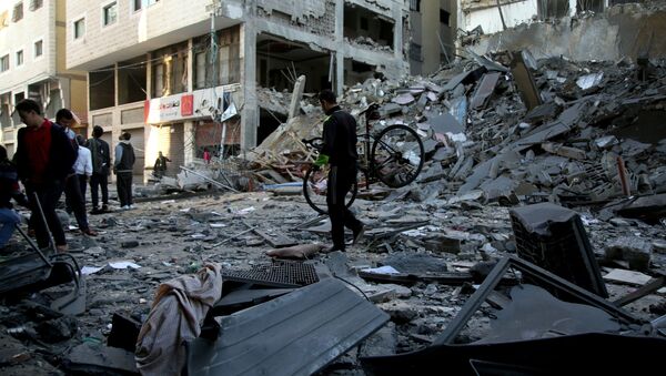 Prédios em ruínas após ataques com mísseis lançados por Israel na Faixa de Gaza - Sputnik Brasil