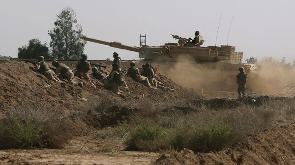 Iraqi security forces participate in a drill as U.S. forces help train them in Taji, north of Baghdad, Iraq. - Sputnik Brasil