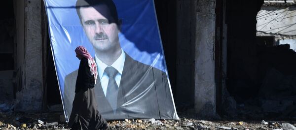 Retrato do presidente da Síria, Bashar Assad, no subúrbio de Aleppo - Sputnik Brasil