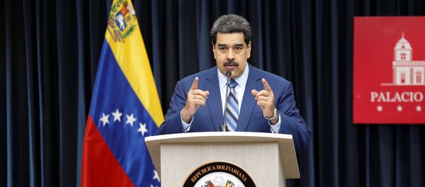 Presidente da Venezuela, Nicolás Maduro, durante coletiva de imprensa no Palácio de Miraflores em Caracas, 12 de dezembro de 2018 - Sputnik Brasil