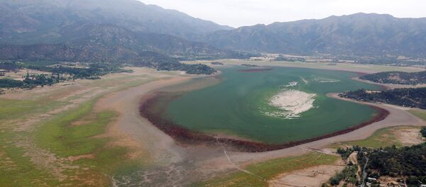 Os investigadores da Universidade do Chile explicam que o desaparecimento do reservatório foi provocado pela expansão das cidades e da agricultura, bem como pelas mudanças climáticas e secas graves na região - Sputnik Brasil