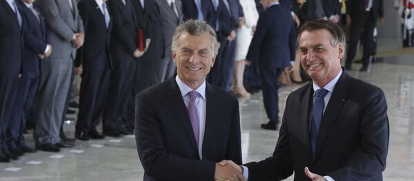 Presidente da Argentina, Mauricio Macri, e o presidente do Brasil, Jair Bolsonaro, em Brasília. - Sputnik Brasil
