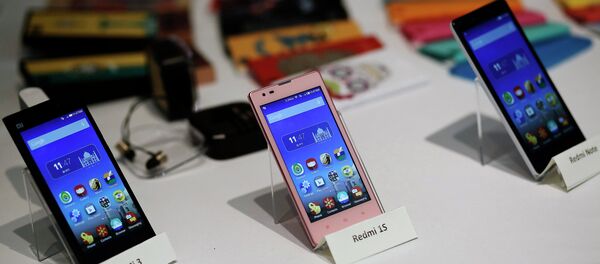 Telefones da Xiaomi em feira na Índia - Sputnik Brasil