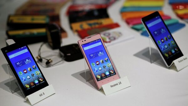 Telefones da Xiaomi em feira na Índia - Sputnik Brasil