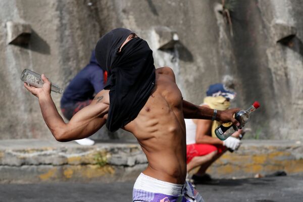 Manifestante em Caracas, Venezuela - Sputnik Brasil
