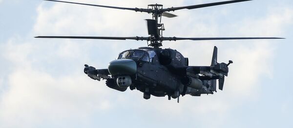 Um helicóptero Ka-52 durante o show aéreo no fórum internacional Army 2015 Um helicóptero Ka-52 durante o show aéreo no fórum internacional Army 2015 - Sputnik Brasil