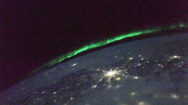 Aurora boreal vista da Estação Espacial Internacional (EEI) - Sputnik Brasil