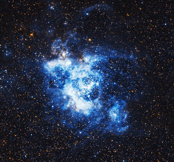A nebulosa de grandes dimensões NGC 604 que se encontra a cerca de 3 milhões de anos-luz da Terra na constelação do Triângulo - Sputnik Brasil