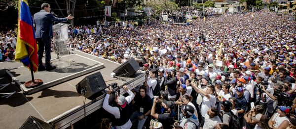 Líder da oposição e autoproclamado presidente interino da Venezuela, Juan Guaidó, durante a manifestação em Caracas Líder da oposição e autoproclamado presidente interino da Venezuela, Juan Guaidó, durante a manifestação em Caracas - Sputnik Brasil