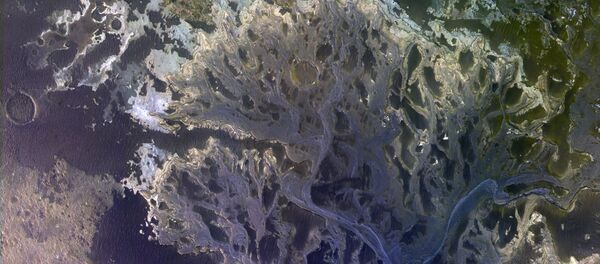 O delta de um rio extinto na cratera Eberswalde, em Marte O delta de um rio extinto na cratera Eberswalde, em Marte - Sputnik Brasil