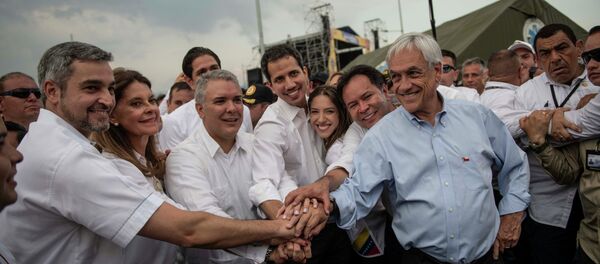 O presidente do Chile, Sebastián Piñera, o líder da oposição venezuelana Juan Guaidó, o presidente da Colômbia, Ivan Duque e o presidente do Paraguai, Mario Abdo Benitez, participam do concerto Venezuela Live Aid na fronteira entre Colômbia e Venezuela, na cidade de Cucuta. - Sputnik Brasil