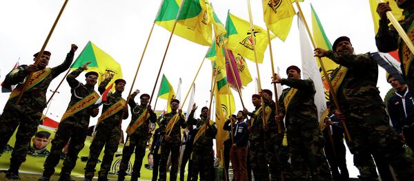 Membros da Brigada do Hezbollah no Iraque, onde o grupo libanês participa das operações para deter o avanço do Estado Islâmico - Sputnik Brasil
