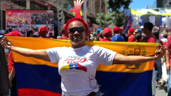 Participante de manifestação de apoio ao presidente venezuelano Nicolás Maduro em Caracas, Venezuela - Sputnik Brasil