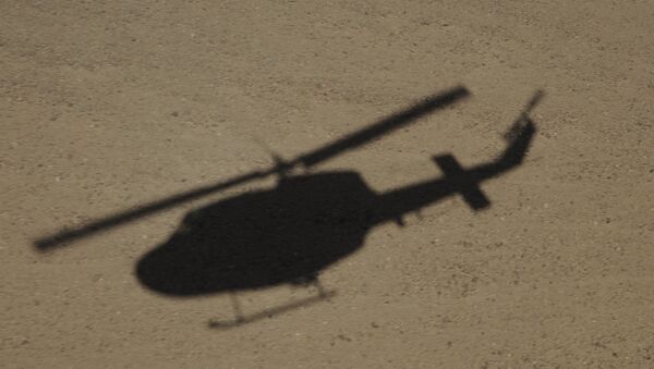 Sombra de helicóptero AB-212 da Força Aérea italiana, no Afeganistão (imagem de referencia) - Sputnik Brasil