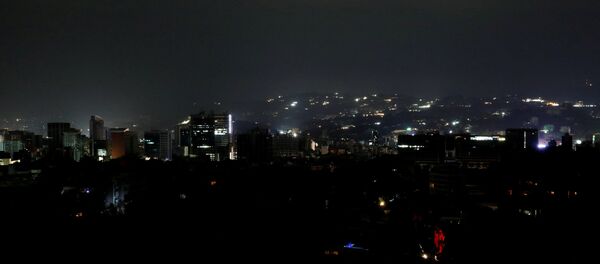 Visão geral da capital da Venezuela, Caracas, durante um blecaute que atingiu diversos estados venezuelanos no dia 7 de março de 2019. - Sputnik Brasil