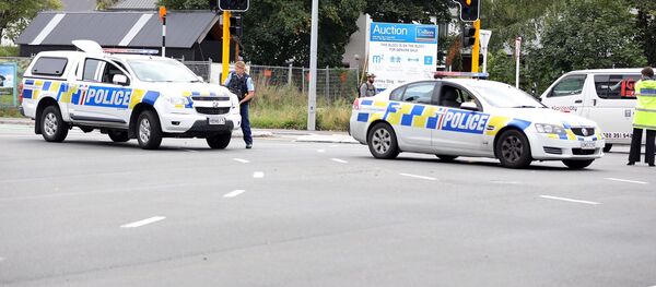 Carros da polícia na área cercada da mesquita Al Noor em Christchurch, Nova Zelândia, 15 de março de 2019 - Sputnik Brasil
