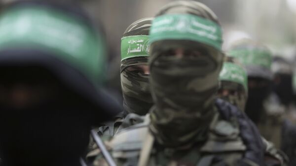 Atiradores palestinos do Hamas comparecem ao velório de seis combatentes mortos em confrontos com as Forças de Defesa de Israel (arquivo) - Sputnik Brasil
