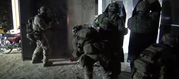 Agentes de segurança em operação especial na região do Daguestão, na Rússia. - Sputnik Brasil